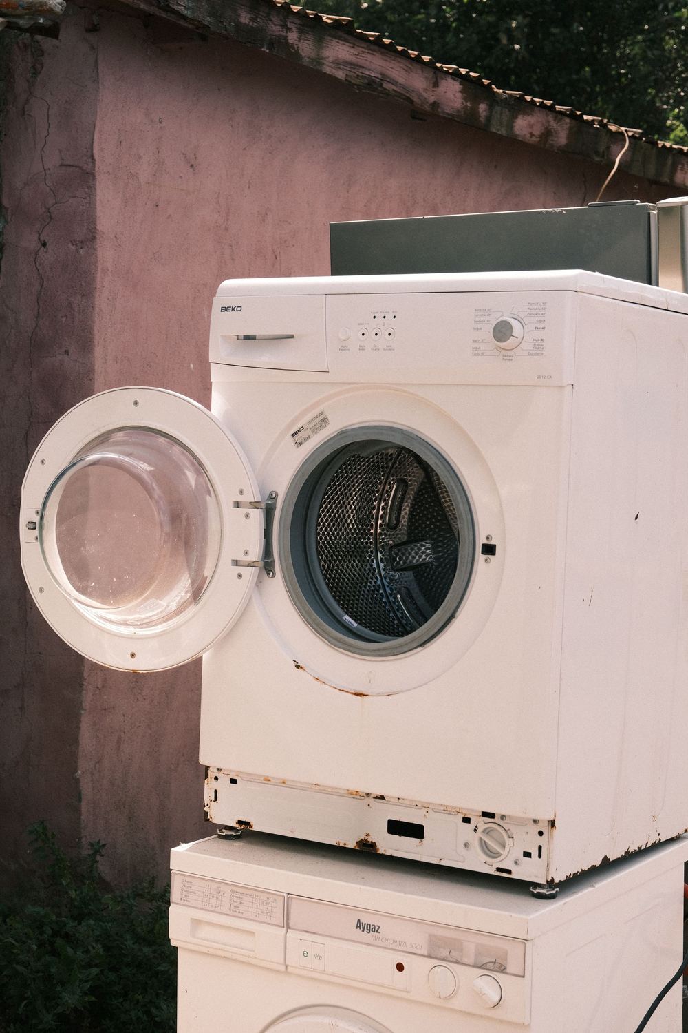 Front-loading tumble dryer with its door open
