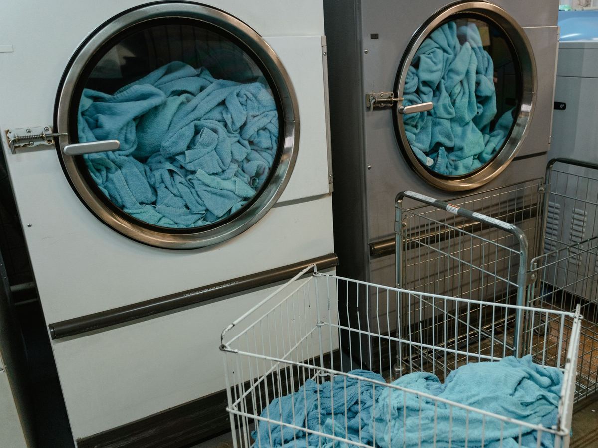 Tumble dryers with towels inside the drums