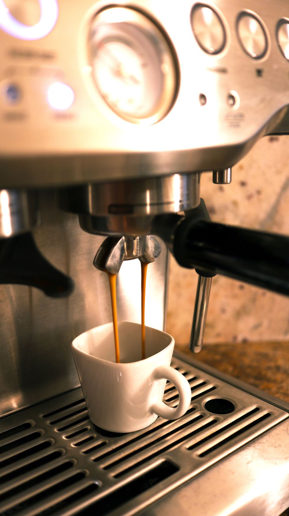 Espresso pouring from a home espresso machine