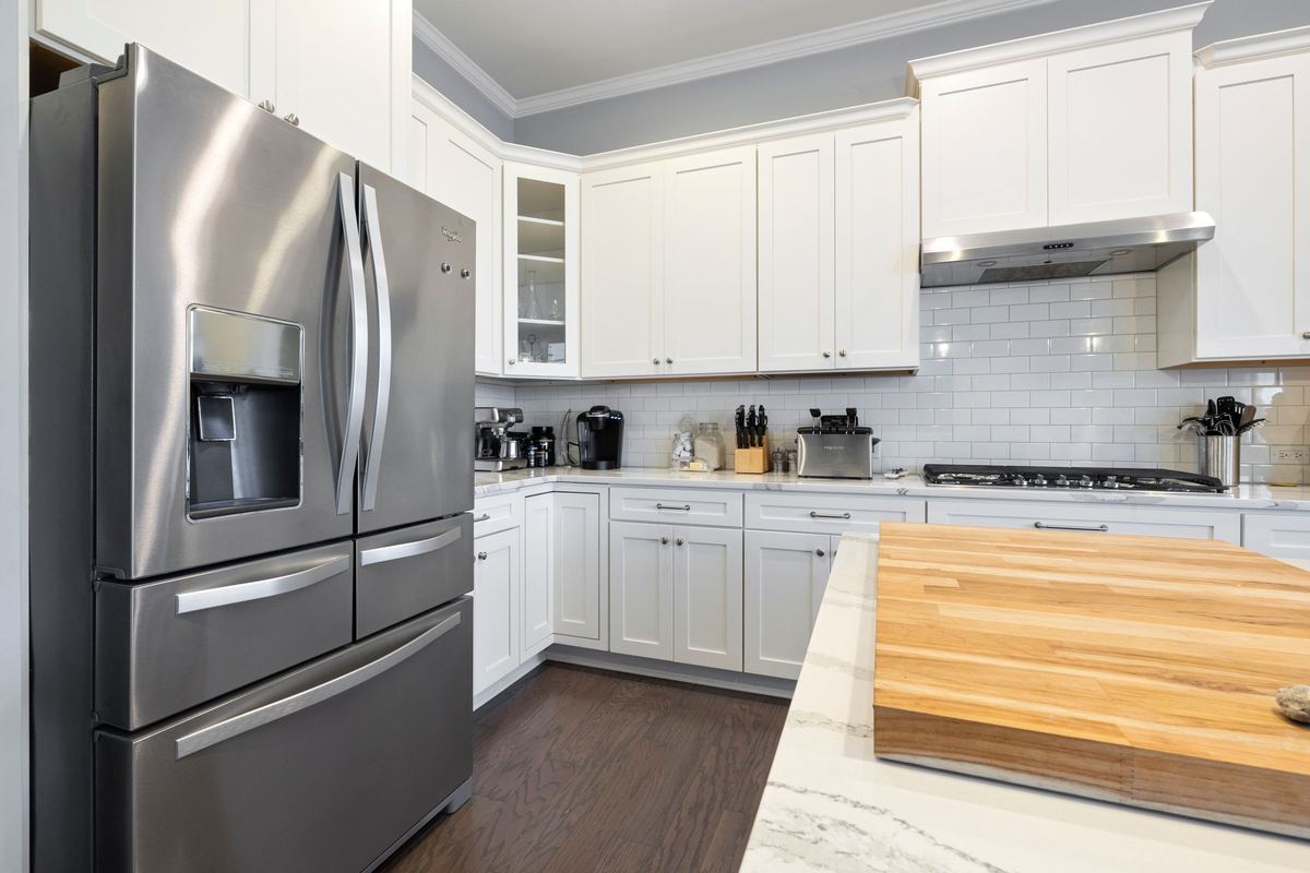 Kitchen with a stainless steel French-door fridge