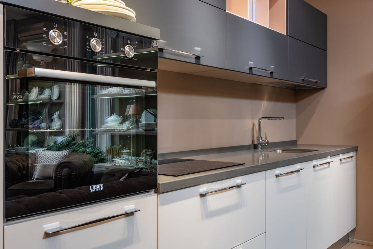 Black built-in electric oven in a modern kitchen