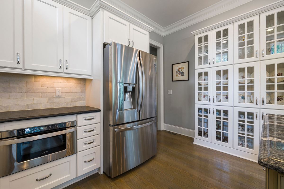 Kitchen with a stainless steel French-door fridge and built-in microwave drawer
