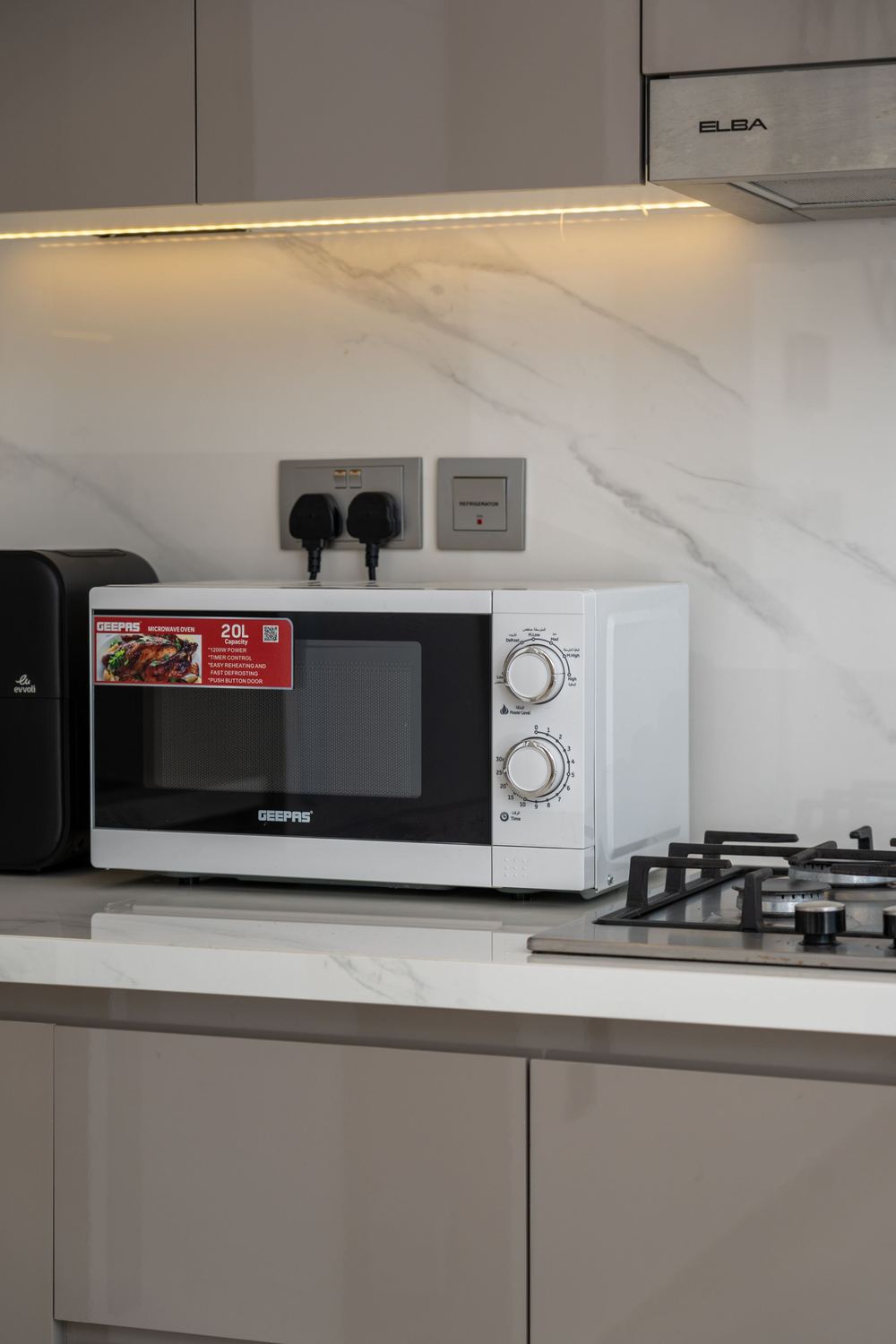 White countertop microwave in a kitchen