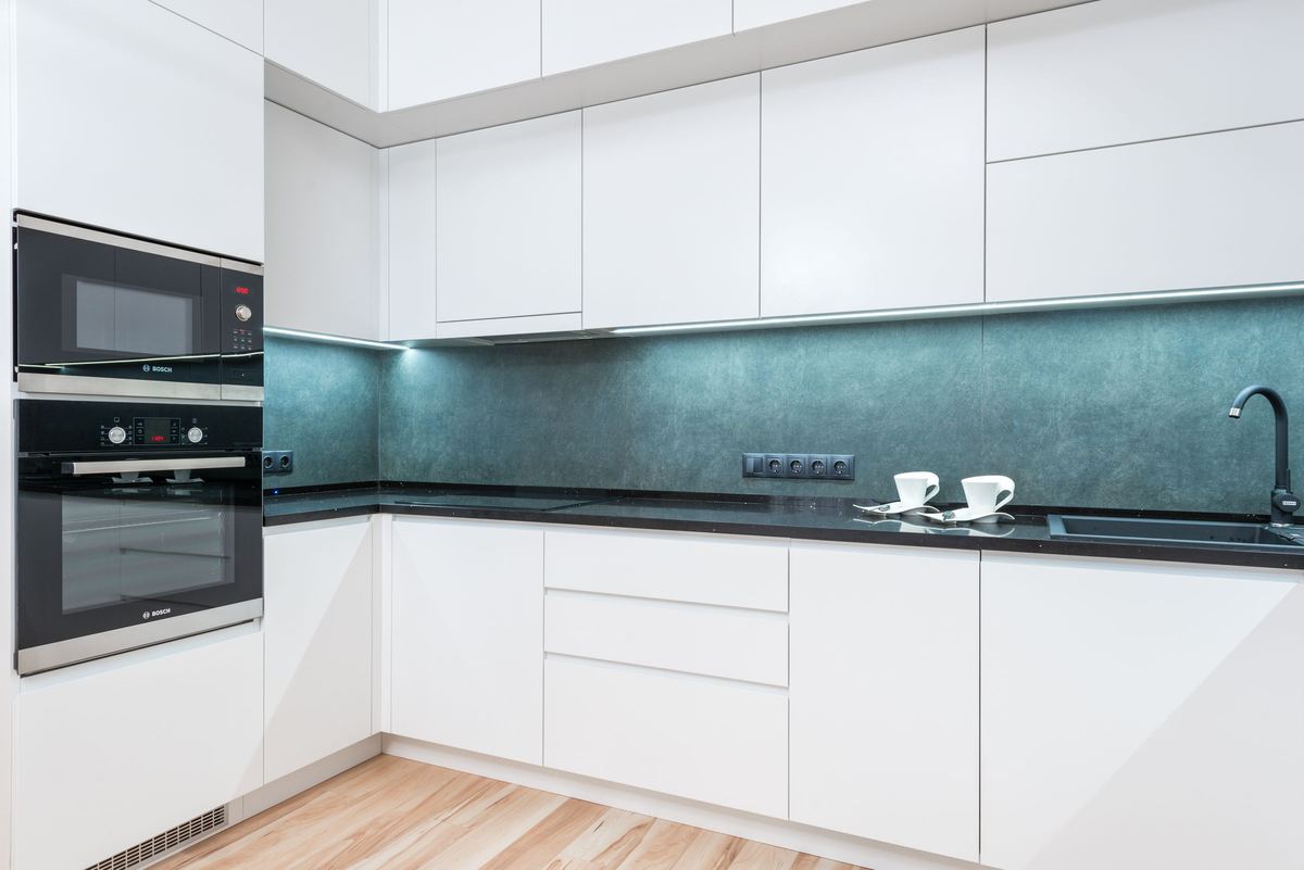 Built-in oven and microwave in a white kitchen